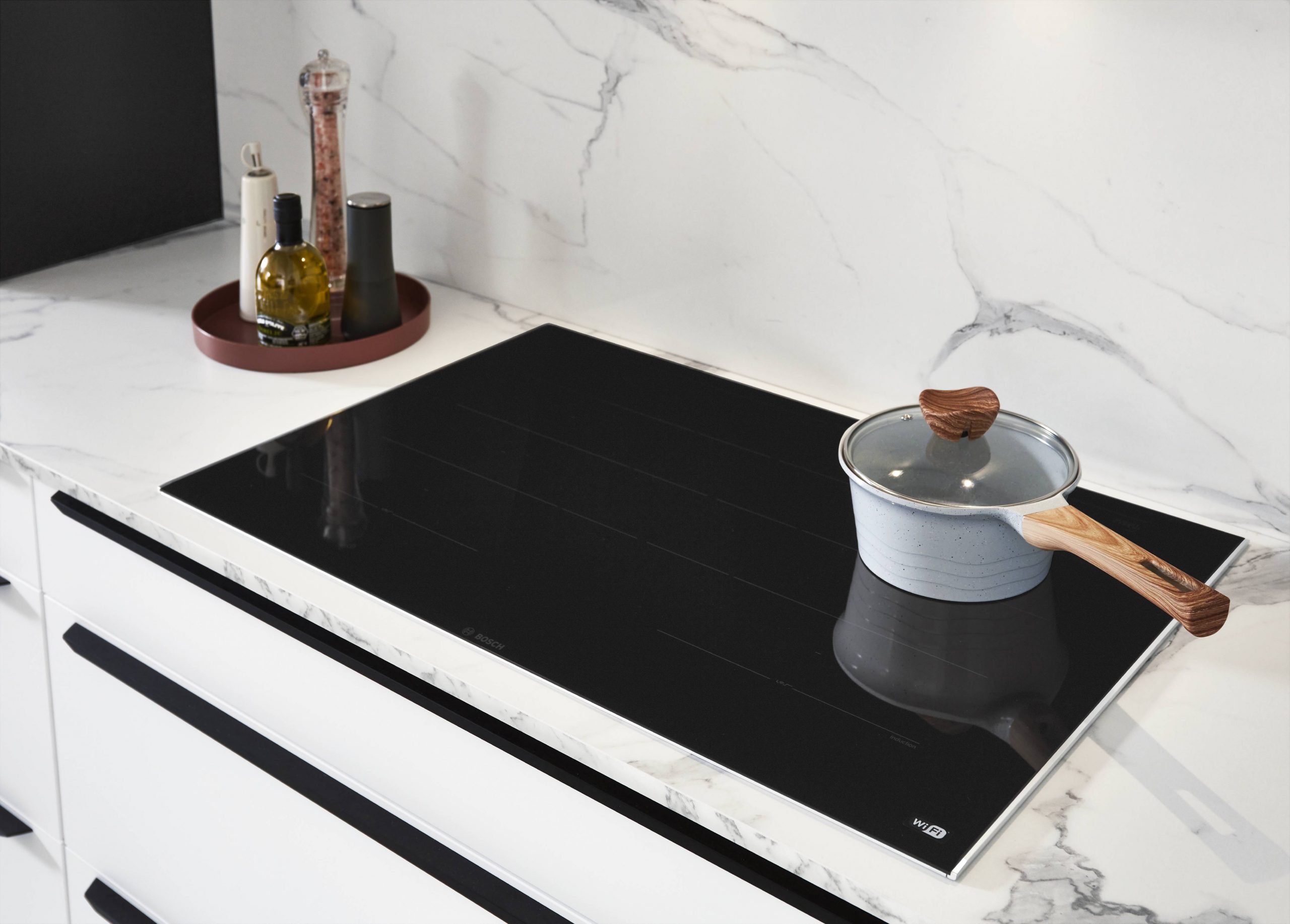 Cocina de diseño con distribución práctica en Belmo